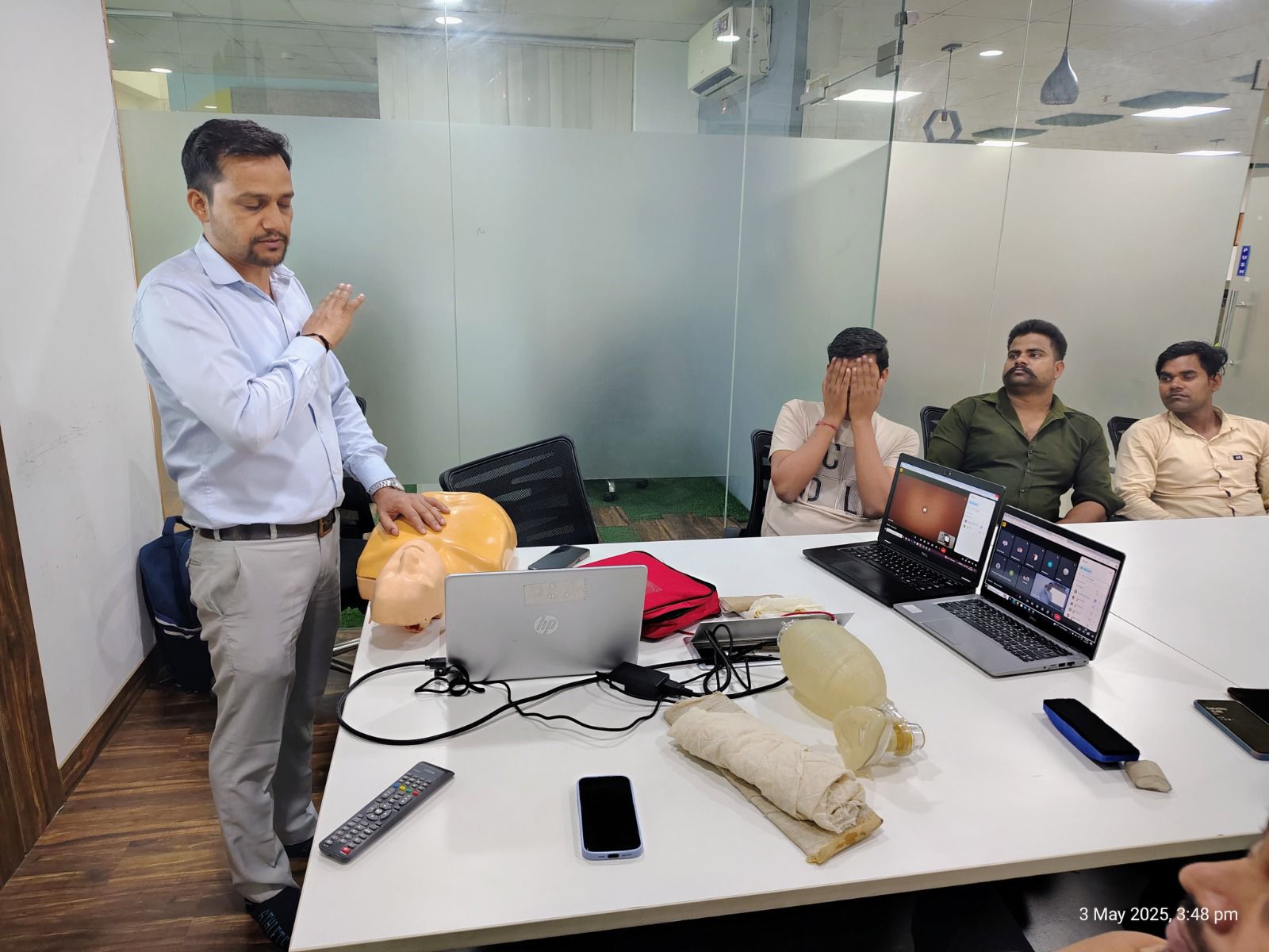 Chest-compression demonstration on a CPR mannequin